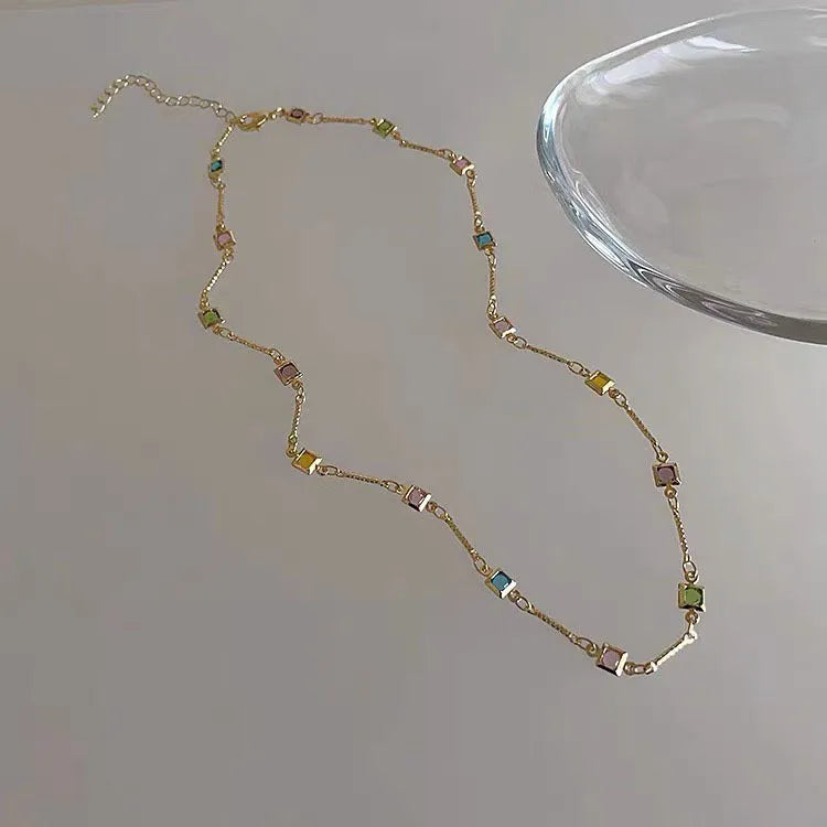 Square colour geometric clavicle chain necklace in gold finish with artificial crystal details