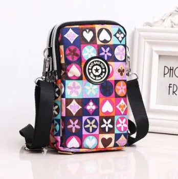 Vertical mobile phone bag in black with Oxford Spinning texture and zipper closure