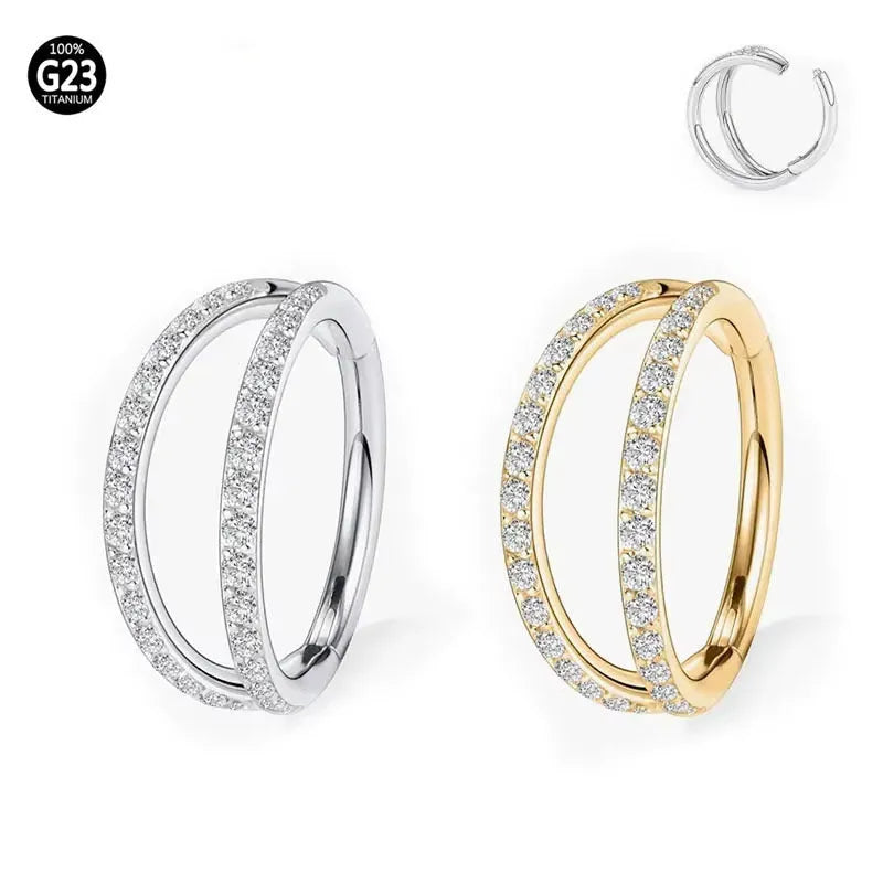 G23 titanium alloy puncture-style nose ring on a plain background showing steel and gold colour options.
