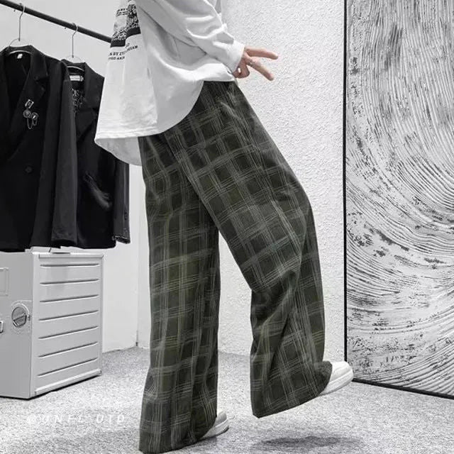 Men's black and green plaid loose fit straight leg trousers with mid waist design