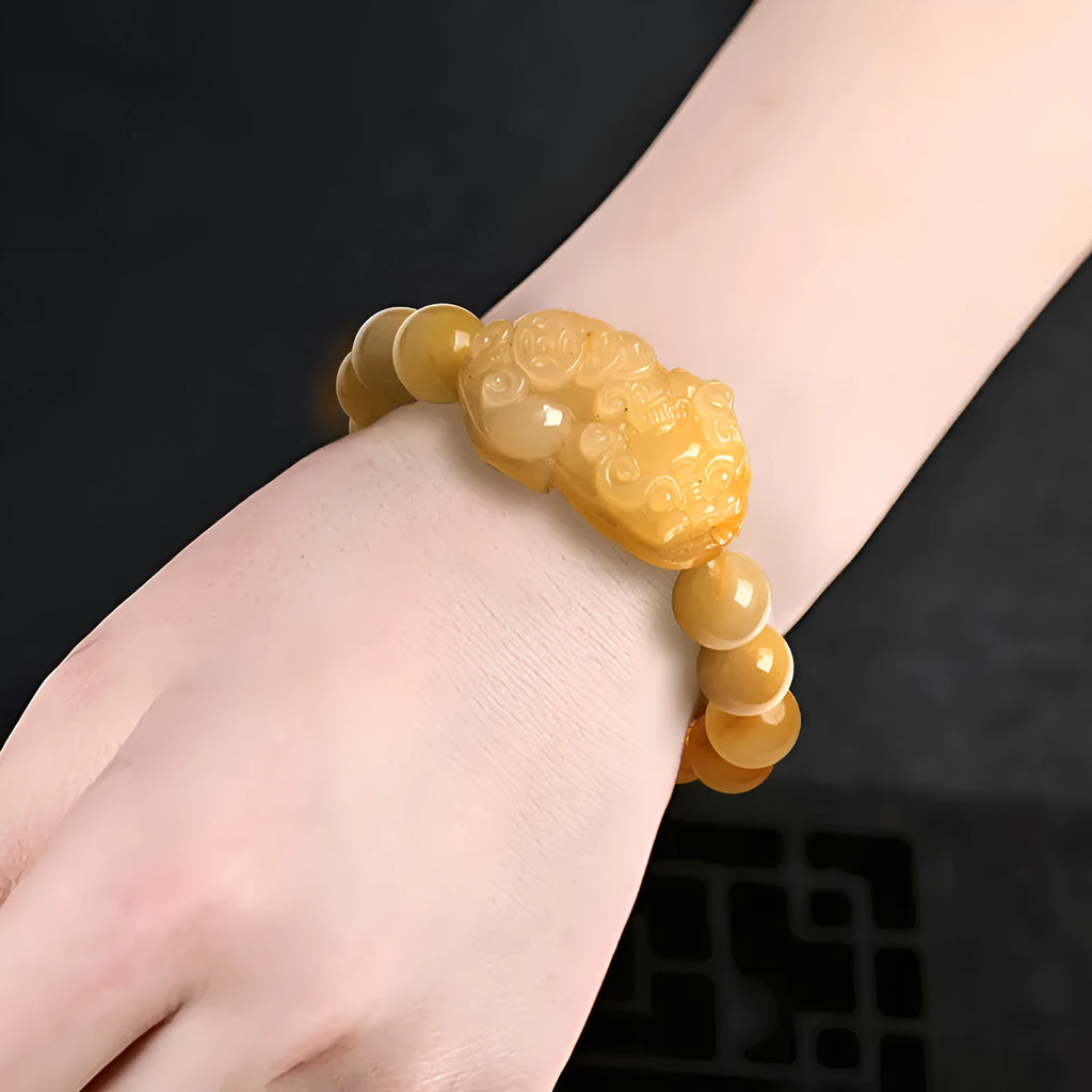 Carved Golden Thread Jade money bracelet showing Chinese coin charm and jade beads in two size options
