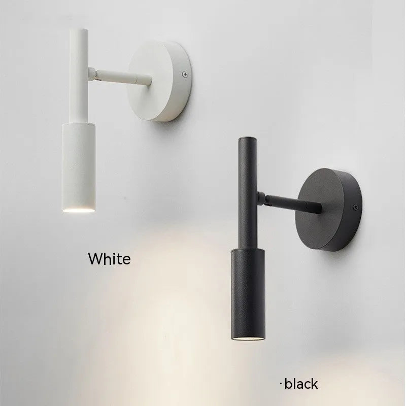 Modern wrought iron wall lamp in black or white with three colour light options