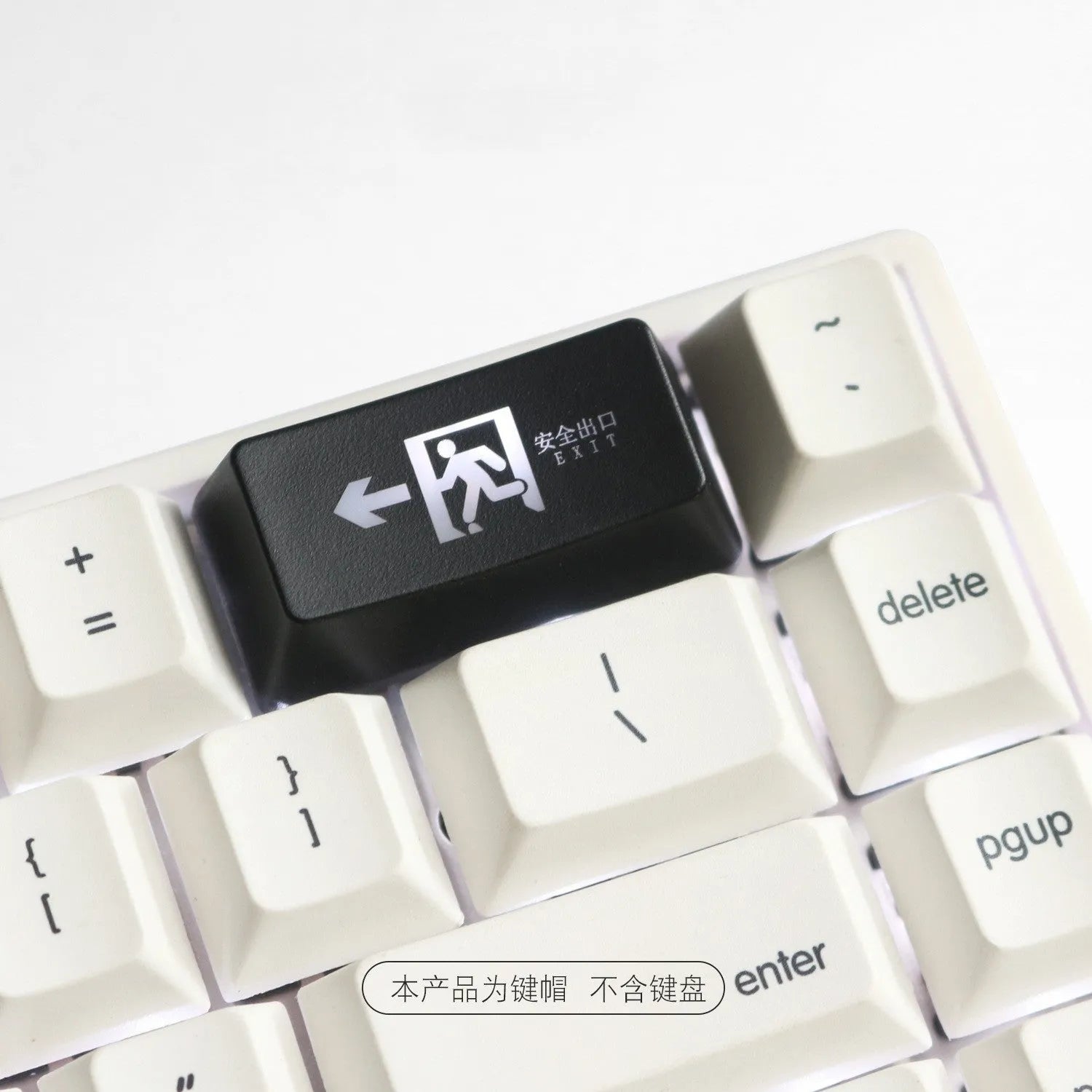 Transparent mechanical keyboard key cap with red evacuation exit symbol for backspace function