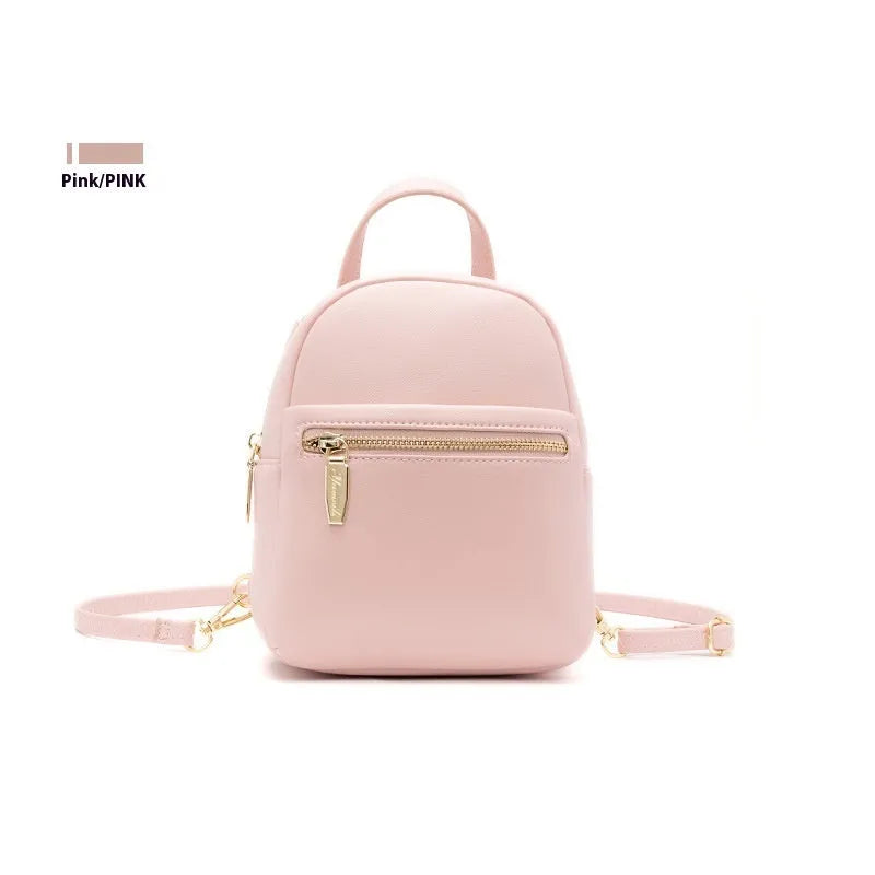 Soft PU mini backpack in street trend style with contrast colour detailing and external pocket.