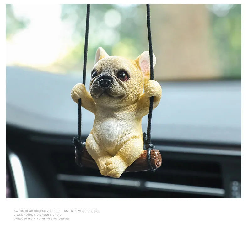 Cartoon-style resin bulldog car pendant hanging ornament in black, white, or yellow.