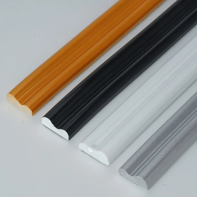 Flexible PVC self-adhesive wall shaping frame in black, gold, silver, and white colours.