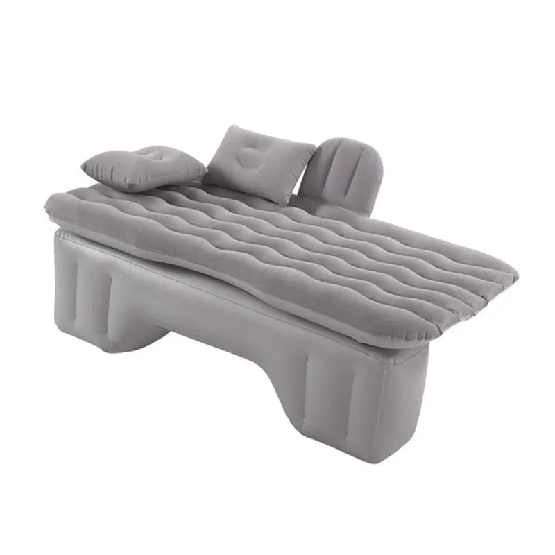 Blue car inflatable mattress with two pillows folded for storage, 135x70cm