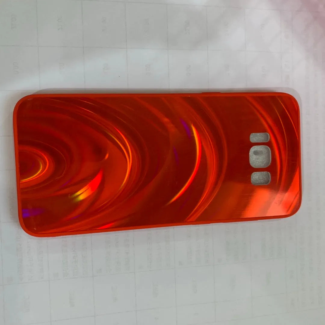 Marble pattern shockproof silicone phone case for Samsung Galaxy models on a table.