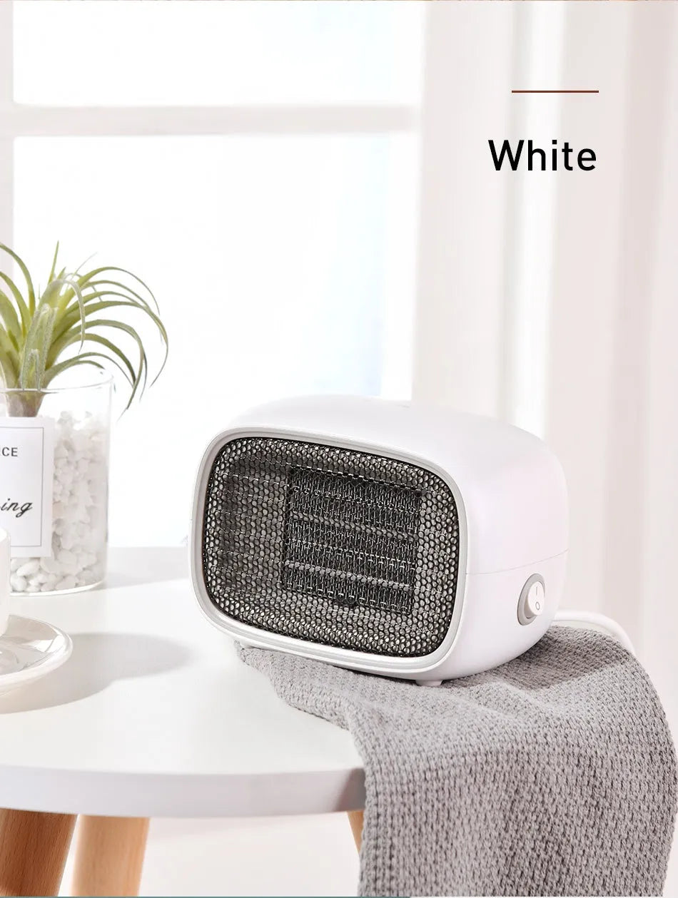 Mini ceramic heater with compact dimensions and green, white, or yellow colour options