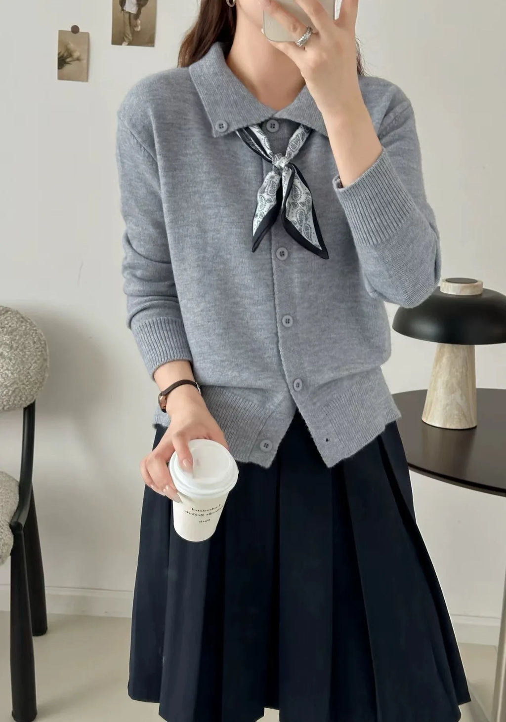 Lapel scarf sweater cardigan in acrylic knit, shown in milky white with splicing detail and long sleeves.