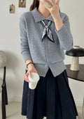 Lapel scarf sweater cardigan in acrylic knit, shown in milky white with splicing detail and long sleeves.