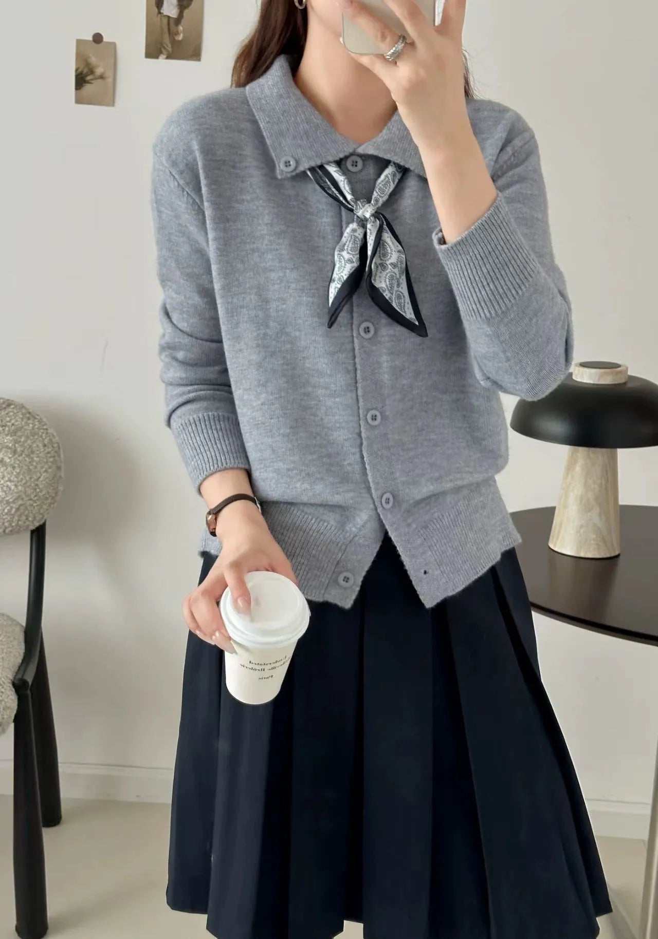 Lapel scarf sweater cardigan in acrylic knit, shown in milky white with splicing detail and long sleeves.