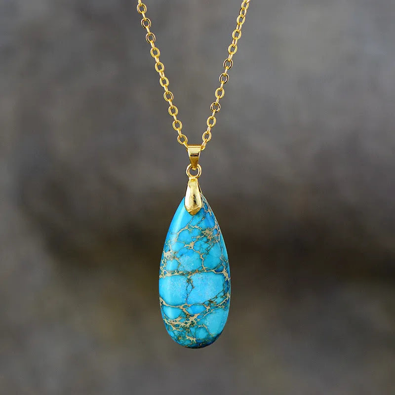 Emperor Stone jade water drop pendant necklace on an 18K gold plated chain, showing heart-shaped and constellation design options.