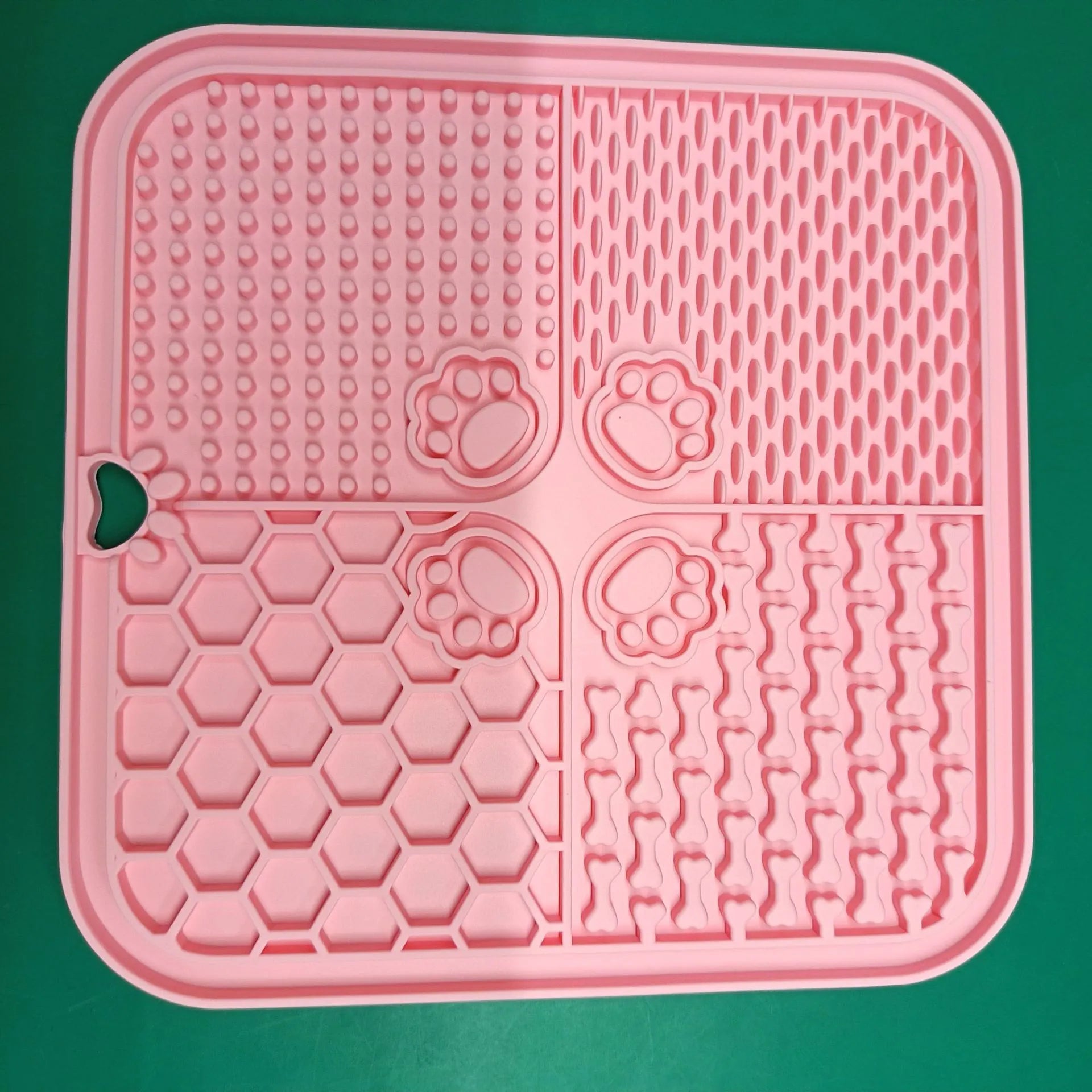 Silicone dog slow food mat in black with raised ridges to slow eating, anti-scatter design