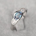 Women's geometric ellipse ring with zircon stones in white gold colour on copper band