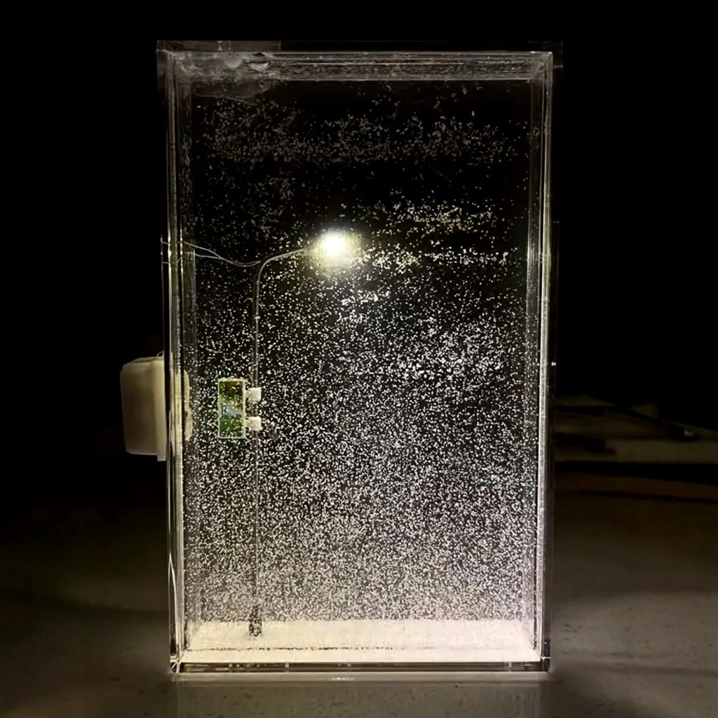 DIY kit components for assembling a snowy landscape night light with LED fairy lights