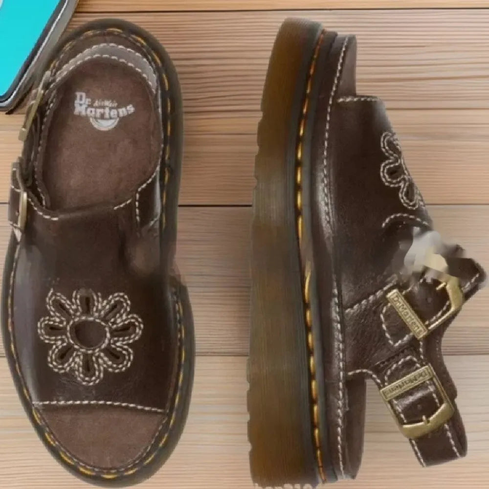 Men's black embroidered floral beach sandals with flat heel and PU upper.