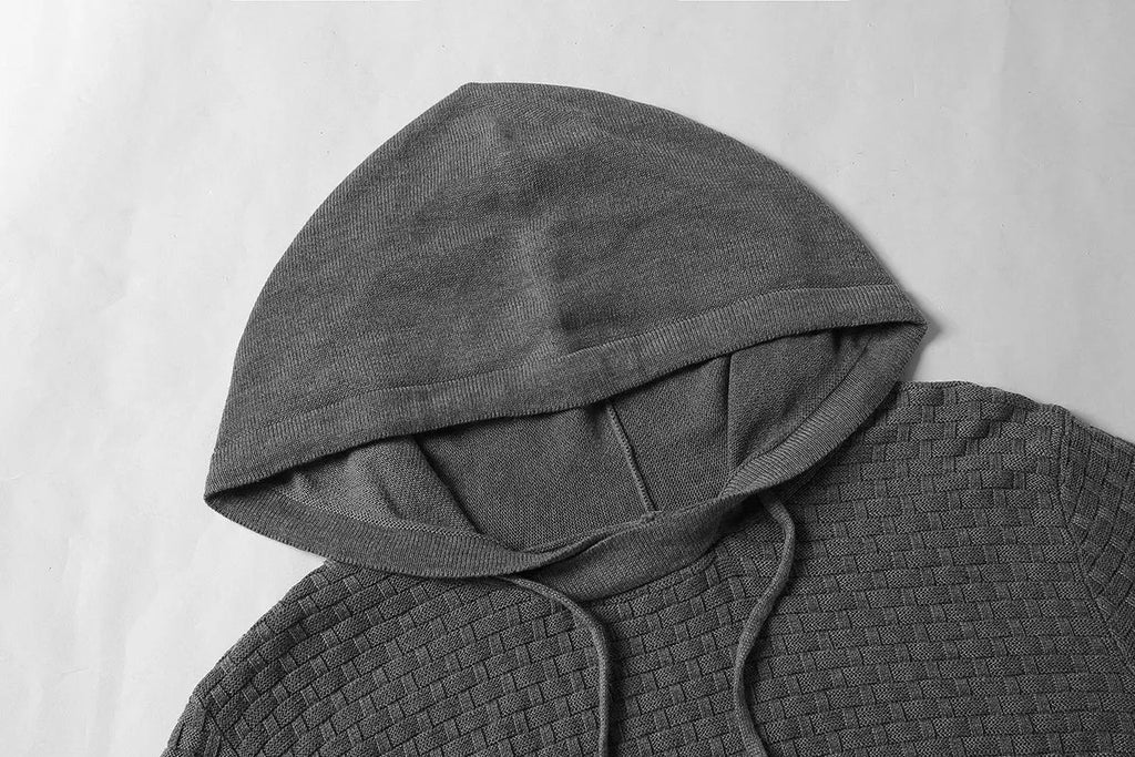 A men's hoodie sweater in a cotton and polyester blend, shown in one of nine available colours.