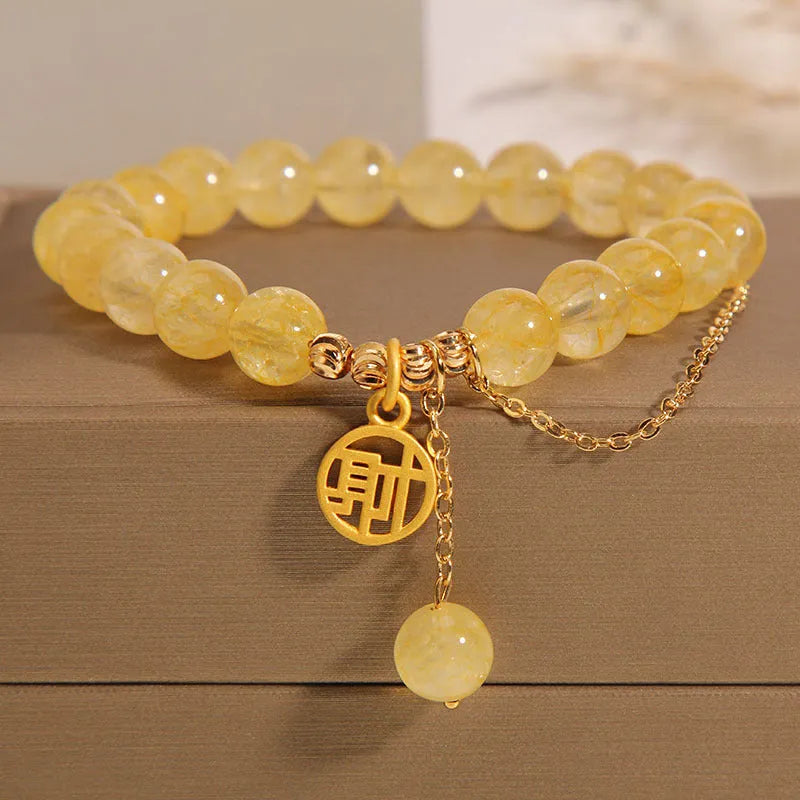 Citrine Chinese character bracelet with tassel detailing showing Caizi and Fu design options