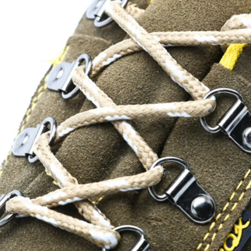 Bronze coloured cow suede leather safety shoes with a steel toe cap and low-cut design.