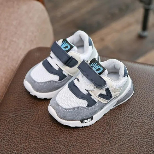 Girls summer mesh running shoes with TPR sole, grey colour, side view showing V-shaped design and breathable upper