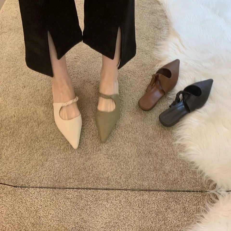 Women's soft leather slippers with a semi-toe box design in dark brown colour