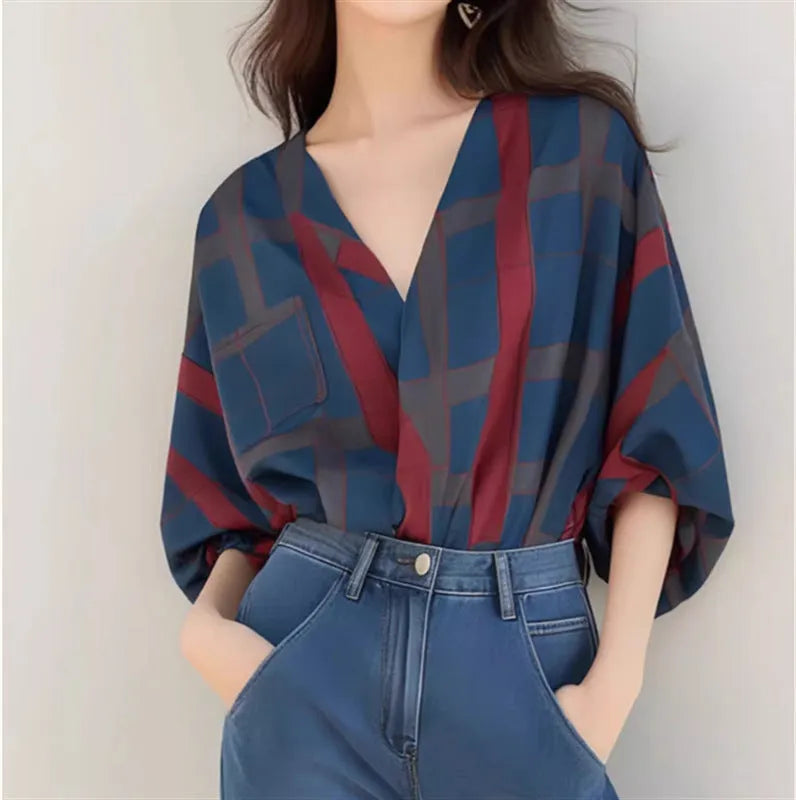 Women's loose polyester pullover top with painted finish and drop-shoulder sleeves in short length, front view