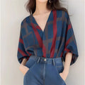 Women's loose polyester pullover top with painted finish and drop-shoulder sleeves in short length, front view