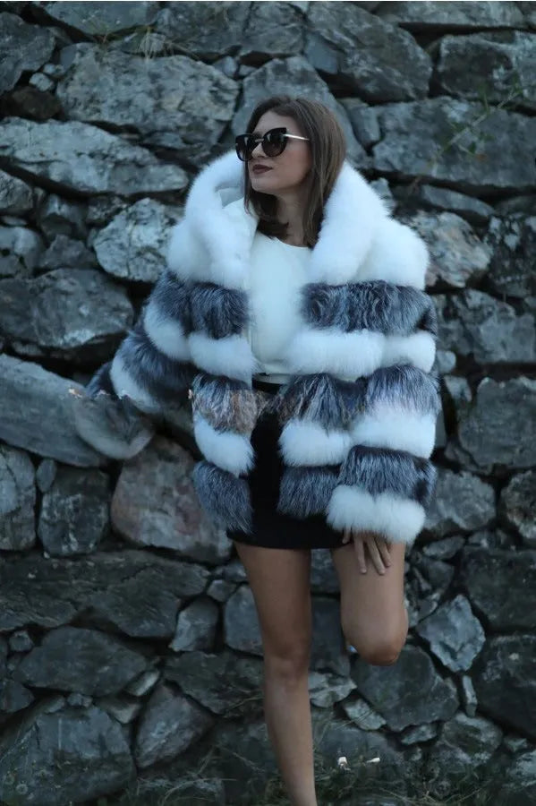 Loose hooded women's coat in artificial fur, shown in brown and white silver fox colours.