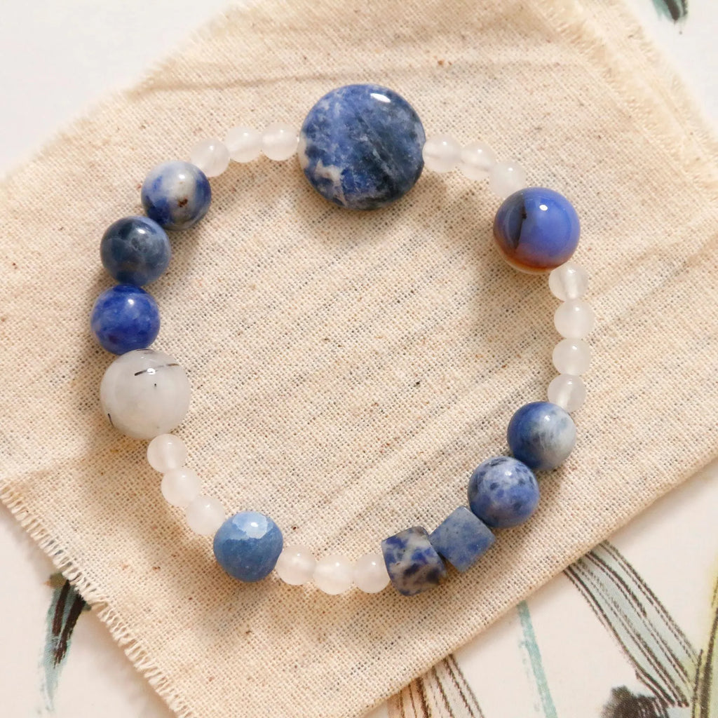 Hand-woven natural stone bracelet with blue point and black hair crystal agate beads