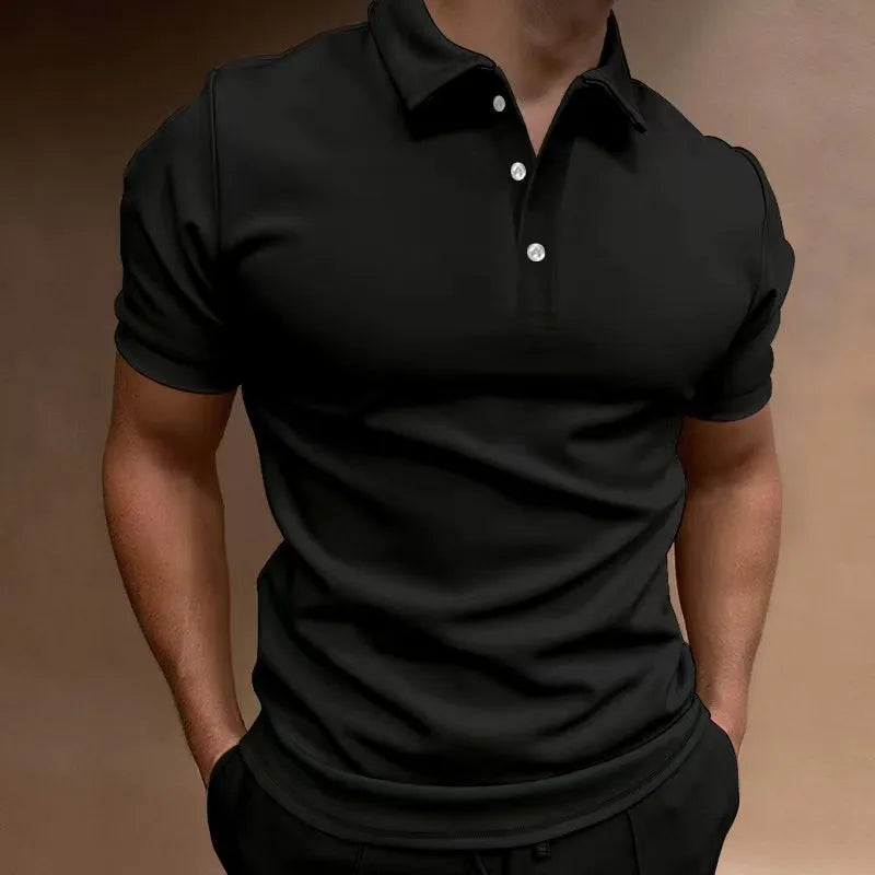 Man modelling a loose fit grey cotton blend short sleeve t-shirt.