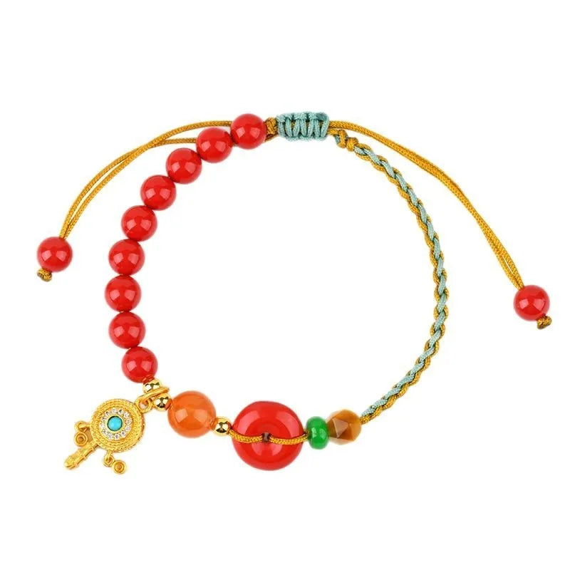 Red hand-woven cinnabar bracelet with geometric peace blessing buckle charm