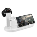 White or black plastic headphone charging stand with a USB port for phones.