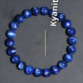Natural blue crystal ball bracelet with geometric shape and Ruyi design on a white background.