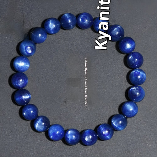 Natural blue crystal ball bracelet with geometric shape and Ruyi design on a white background.