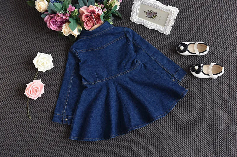 Girls navy denim dress with long sleeves and irregular skirt, cotton-rich fabric, sizes 100-140cm.