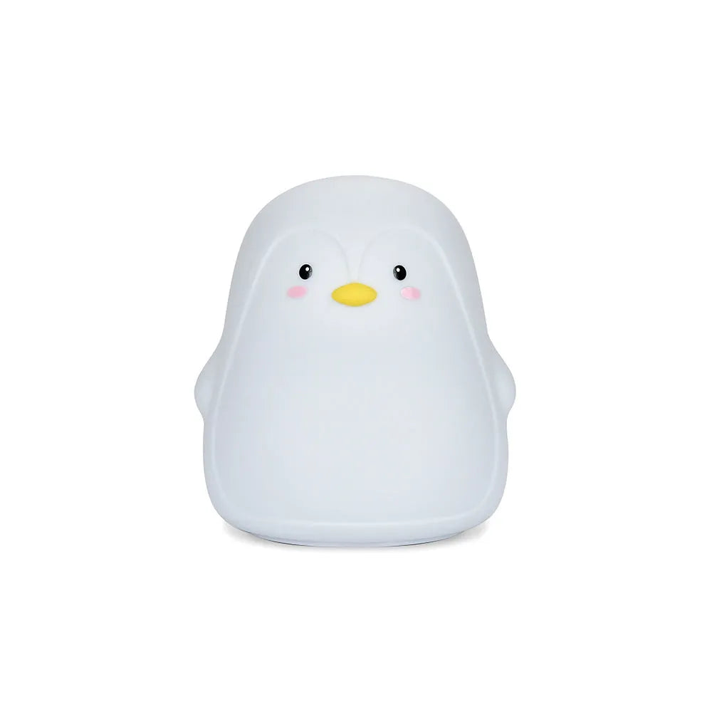 Soft white silicone penguin-shaped rechargeable night light on a surface.