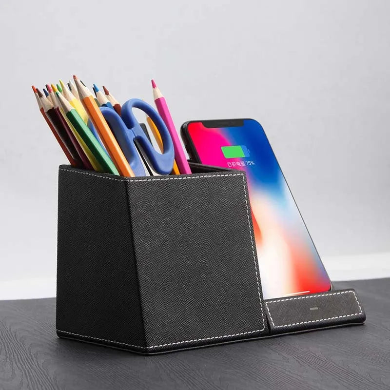 Black leather pen holder wireless charging station for desk organisation with phone charging surface