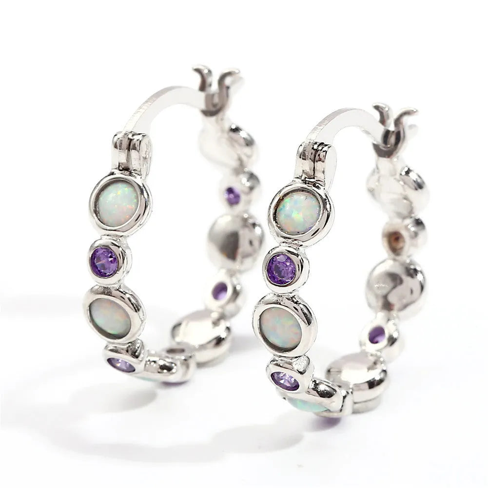 Round synthetic opal and cubic zirconia clip-on earrings in electroplated copper