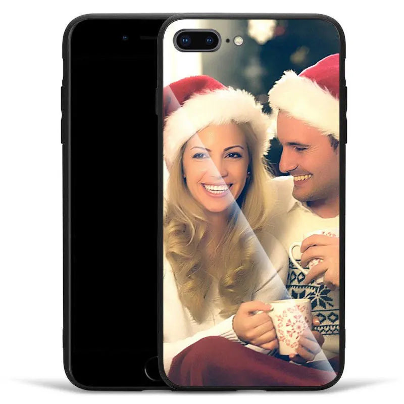 Patterned ultra-thin iPhone case with raised camera bumper edge on a table.