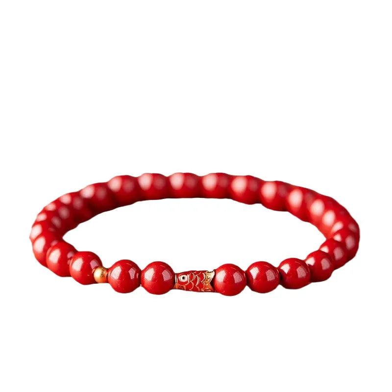 Handmade natural cinnabar koi bracelet with golden ball in national style