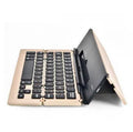 Foldable aluminium Bluetooth keyboard in Silver, compatible with Apple iOS, Android, and Windows devices