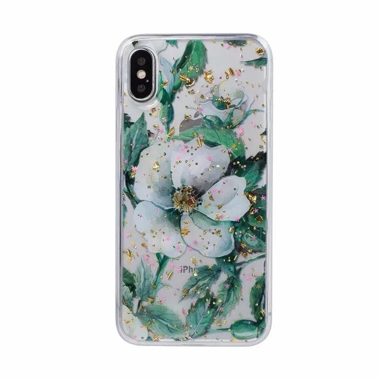 Gold foil epoxy flower pattern iPhone back cover case for iPhone 11 Pro on a table