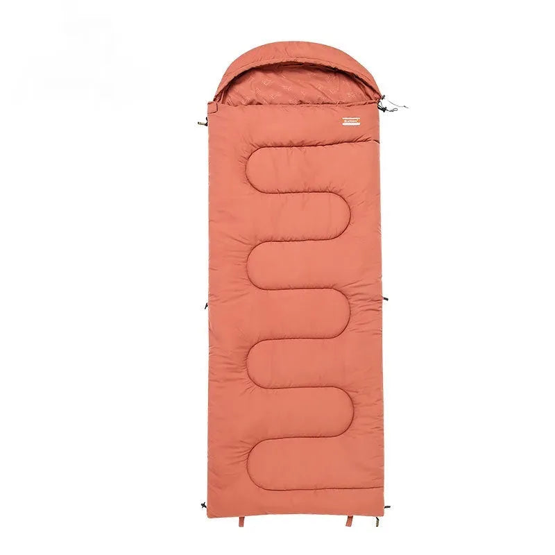 Ochre and olive green portable cotton camping sleeping bag with carry case.