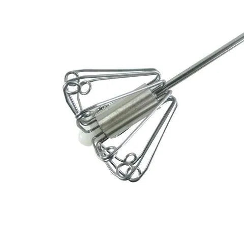 Self spinning whisk with stainless steel head and black handle on a white background