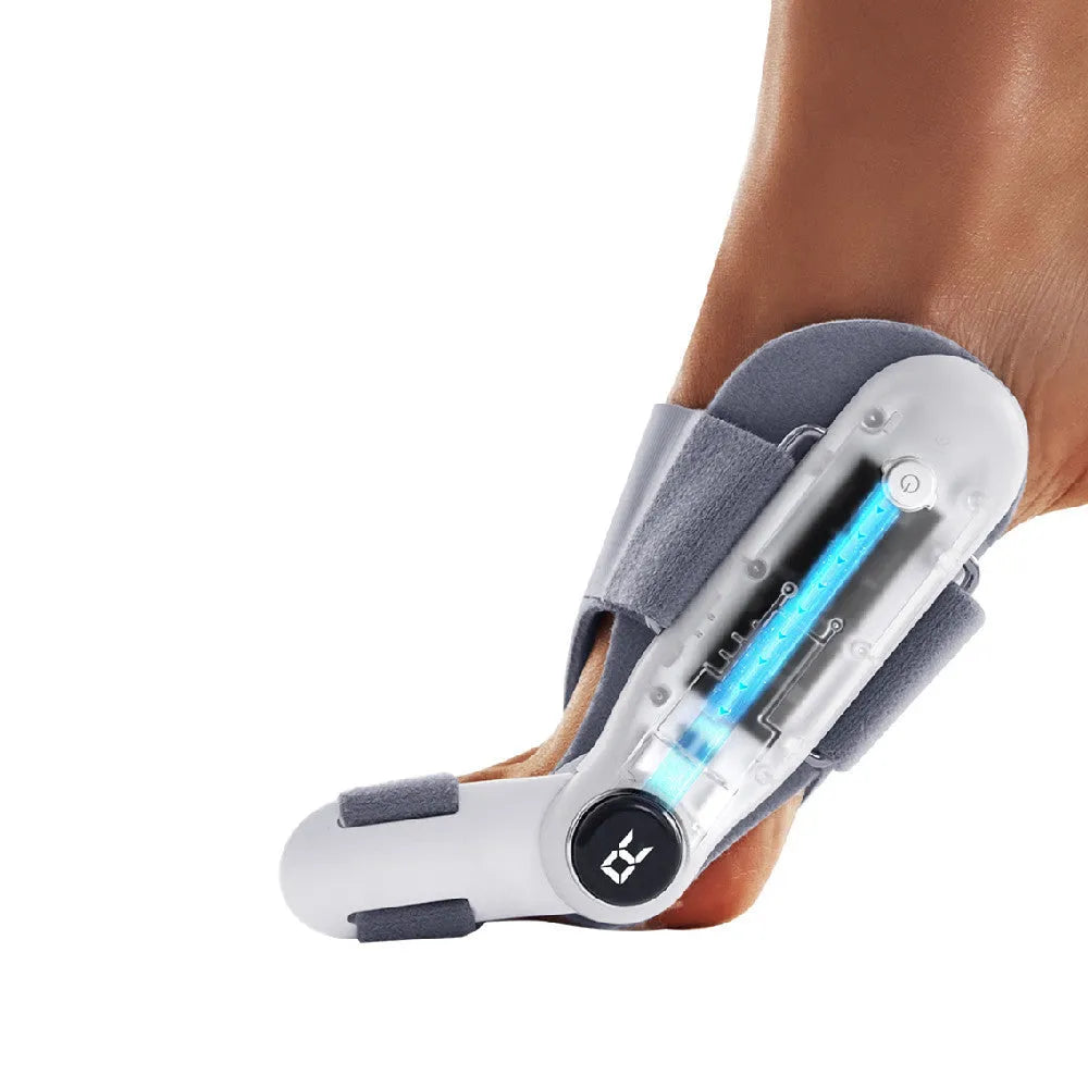 White plastic electric adjustable hallux valgus toe separator with silicone gel pad and Type-C charging port.