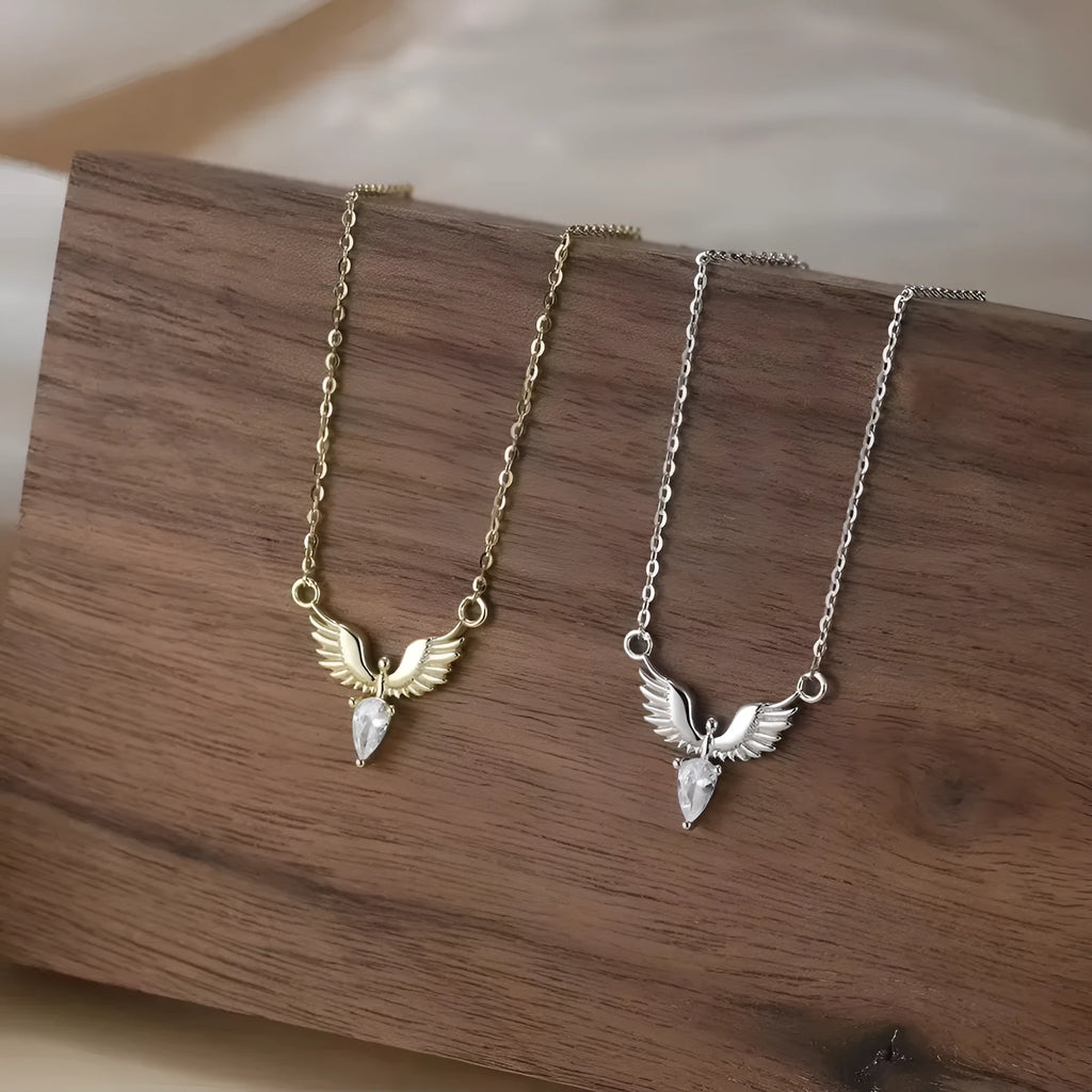 Silver necklace with eagle pendant on an adjustable O-ring chain, shown in white gold colour finish.