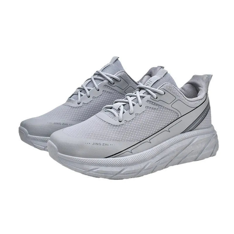 Men's black thick-soled anti-skid lace-up running sneakers with round toe and rubber sole on grey background