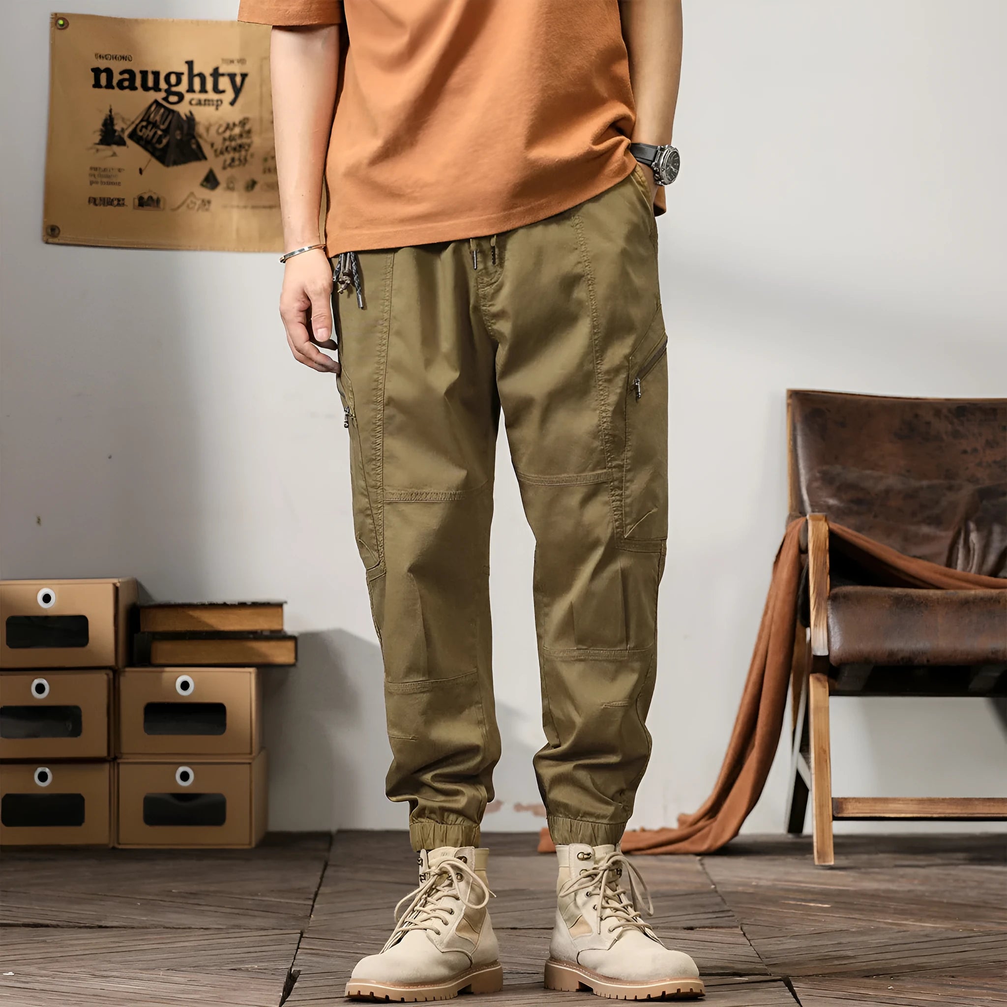 Men's tapered harem trousers in cotton with ankle band and zip placket front