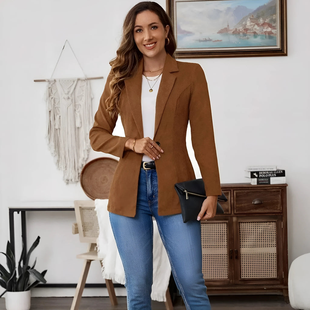 Brown single-breasted suit coat with lapel and long sleeves on a hanger.